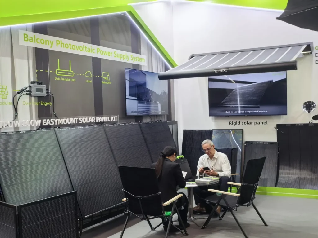 Discussing projects with clients at the exhibition.